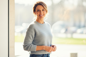 woman in gray sweater