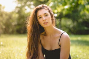 woman in tank top outside